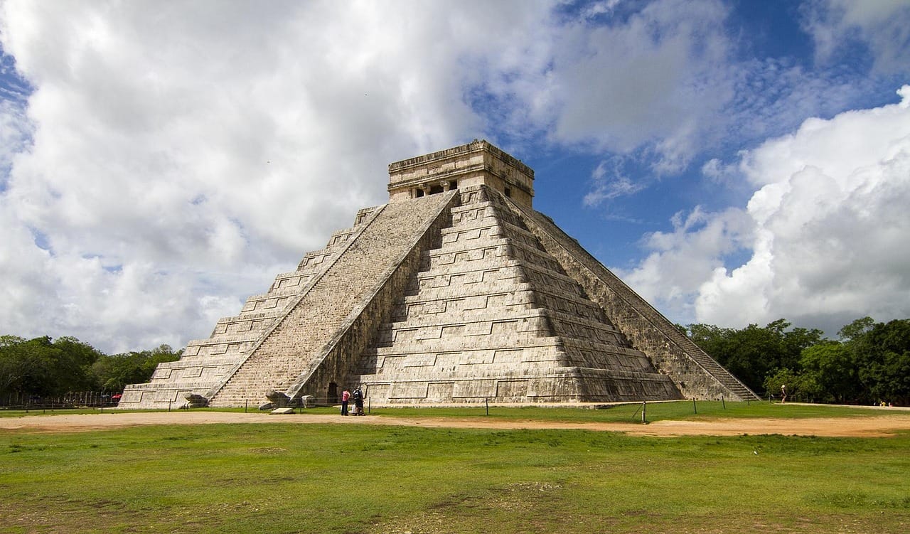 El Castillo at Chichen Itza, seen corner-on across the empty plaza